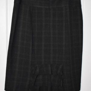 Plaid skirt with ruffle kick pleat